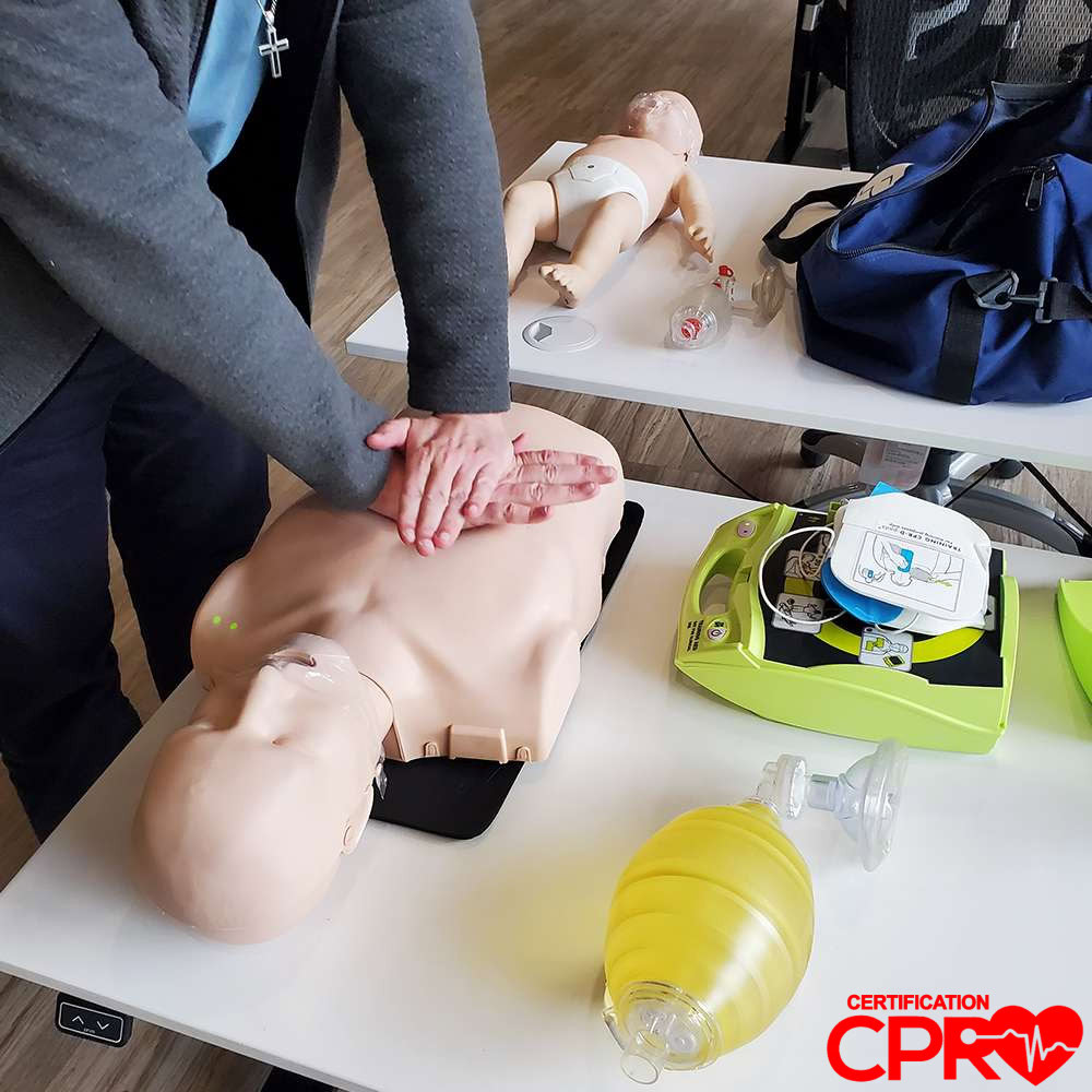 CPR training on mannequin for certification in Arlington.